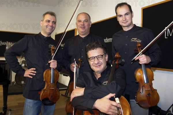 Pierluigi Ruggiero (cellist and artistic director), Sebestyen Sztathatosz (violinist), Zoltan Banfalvi (violinist), Peter Barsony (violist), Ensemble SineQuaNon Berlin, rehearsal for the concert on 15.06.2025 at concert hall Am Gendarmenmarkt, Music Academy, Berlin, 13.06.2025