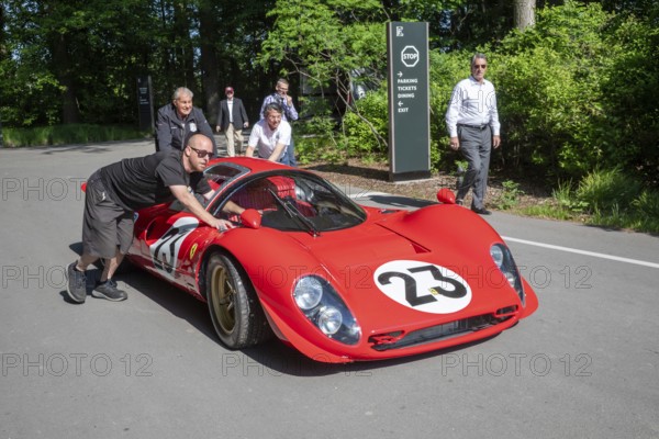 Grosse Pointe Shores, Michigan - The 1965 Ferrari P4 RCR was pushed into place for the media preview of the annual Eyes on Design auto show