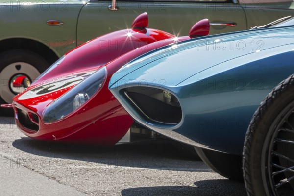 Grosse Pointe Shores, Michigan - The 1966 Pontiac Vivant concept car (right) and the 1966 Ferrari P4 RCR were on display for the media preview of the annual Eyes on Design auto show