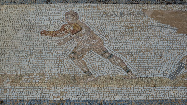 Ancient mosaic of a running man in Greek style, Archaeological Site, Western Excavation, Kos Town, Kos, Dodecanese, Greek Islands, Greece
