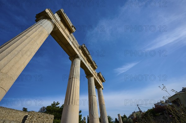 Upward view of ancient columns against the blue sky, Archaeological Site, Xysto Columned Hall, Gymnasio, Western Excavation, Kos Town, Kos, Dodecanese, Greek Islands, Greece