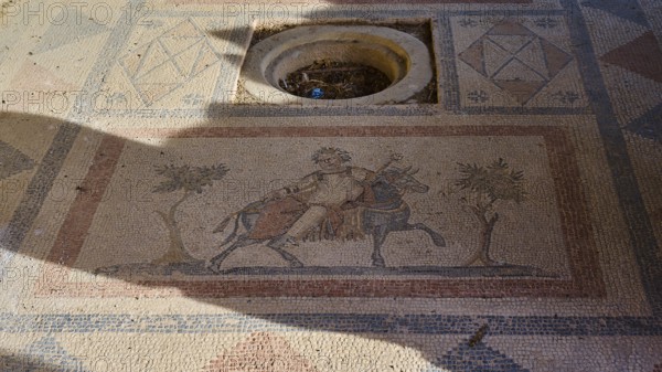 Ancient mosaic depicting a man and a horse surrounded by geometric patterns, House of Beluga (sturgeon), Archaeological Site, Western Excavation, Kos Town, Kos, Dodecanese, Greek Islands, Greece