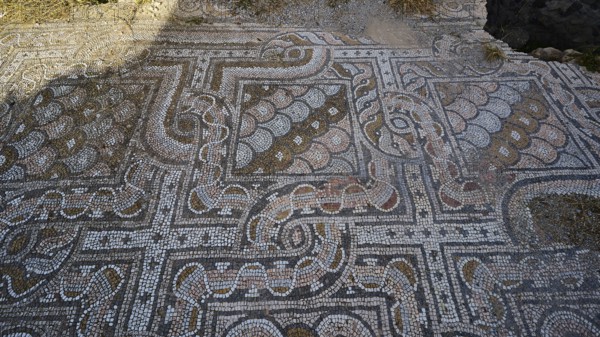 Detail of an ancient mosaic floor with curved geometric patterns, Archaeological Site, Western Baths, Western Excavation, Kos Town, Kos, Dodecanese, Greek Islands, Greece