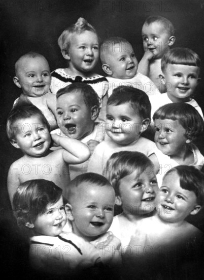 Laughing babies, 1930s, A group of smiling babies and toddlers in a studio portrait, Historical photograph
