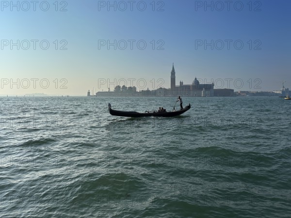 Gondola on the lagoon off Venice, lagoon city of Venice, Veneto, Italy