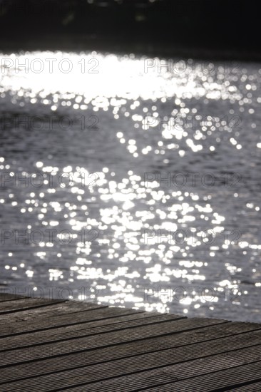 Jetty on a glittering lake, Germany