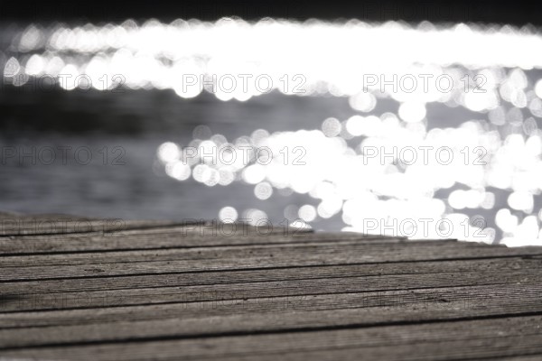 Jetty on a glittering lake, Germany