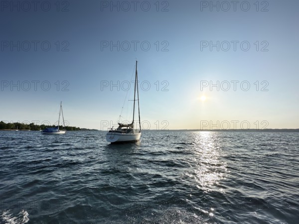 Evening atmosphere, sailing boats on Lake Starnberg, Bavaria, Germany