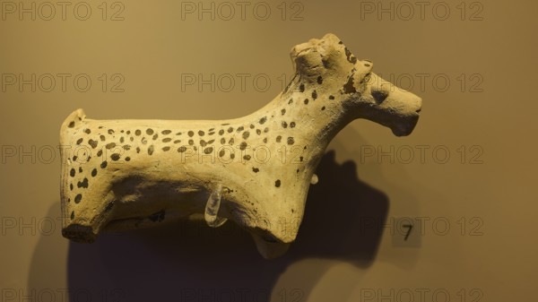 Ceramic figure of a spotted animal, exhibited in a museum-like room, Archaeological Museum, Kos Town, Kos, Dodecanese, Greek Islands, Greece