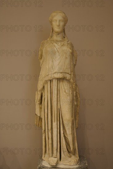 Marble sculpture of an ancient woman in elegant garb, presented in the museum, Archaeological Museum, Kos Town, Kos, Dodecanese, Greek Islands, Greece