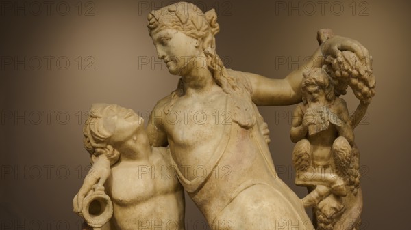 Close-up of the upper parts of an ancient sculpture, with figures and vines, Archaeological Museum, Kos Town, Kos, Dodecanese, Greek Islands, Greece