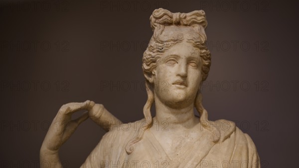 Close-up of the head of a sculpture depicting Artemis with typical hairstyle, Archaeological Museum, Kos Town, Kos, Dodecanese, Greek Islands, Greece