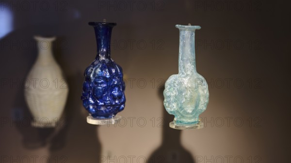 Antique decorative glass bottles in blue and turquoise with relief decoration, Archaeological Museum, Kos Town, Kos, Dodecanese, Greek Islands, Greece