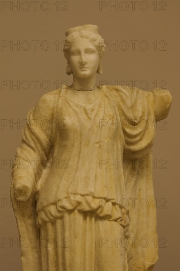 Marble statue of an ancient woman in classical dress, on display in a museum, Archaeological Museum, Kos Town, Kos, Dodecanese, Greek Islands, Greece