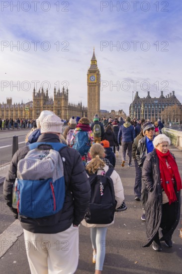 Large group of people on a bridge visiting a famous clock tower, London, United Kingdom, World