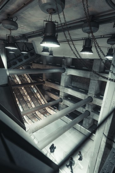 Futuristic space with industrial lamps and concrete architecture, Westminster Station, London, United Kingdom