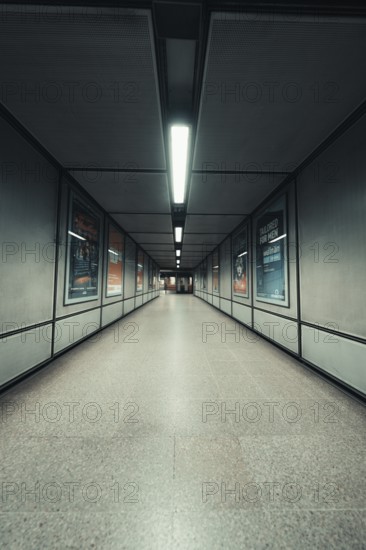Long, illuminated corridor with minimalistic wall decoration, London, United Kingdom