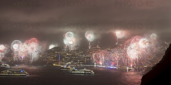New Year's Eve fireworks, dusk, Atlantic Ocean, harbour with cruise ships, Funchal, Madeira, Portugal