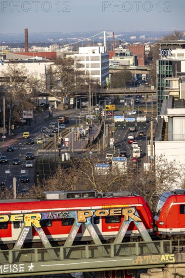 S-Bahn train on the line, railway bridge over Deutz-Mülheimer-Straße, platform tracks in front of Cologne-Messe/Deutz station, North Rhine-Westphalia, Germany