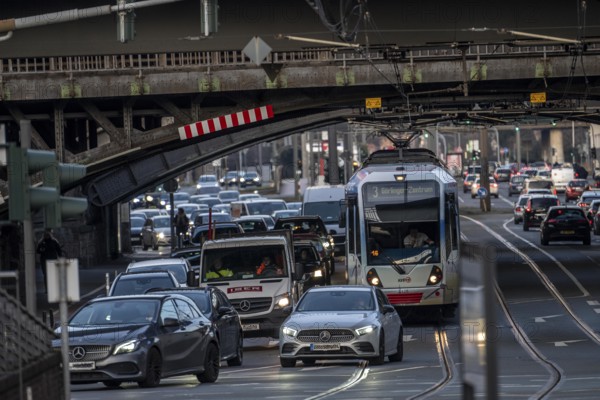 City traffic in Cologne-Deutz, rush hour in the afternoon, Deutz-Mülheimer Straße, railroad bridges, tram, North Rhine-Westphalia, Germany