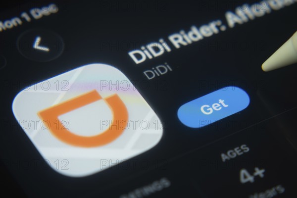 Dhaka, Bangladesh- 01 Dec 2025: A close-up of the DiDi Rider app icon in the App Store on an iPad screen