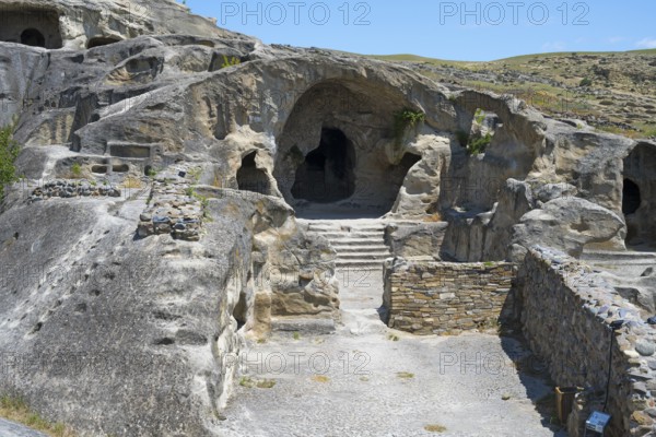 Ancient rock construction with several entrances and a natural setting, Uplistsikhe cave town, Uplistsikhe, Inner Kartli region, Shida Kartli, Georgia