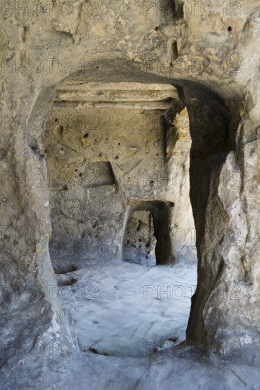 Weathered cave interior with uneven stone walls, cave town Uplistsikhe, Inner Kartli region, Shida Kartli, Georgia