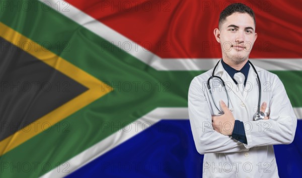 Portrait of medical professional on South Africa flag background. South African national health system