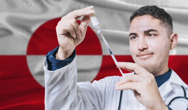 Doctor holding syringe on Greenland flag background. Medical professional holding syringe with Greenlandic flag in the background
