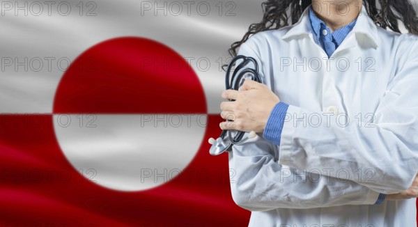Healthcare professional with Greenland flag background. Professional doctor holding stethoscope on Greenland flag background