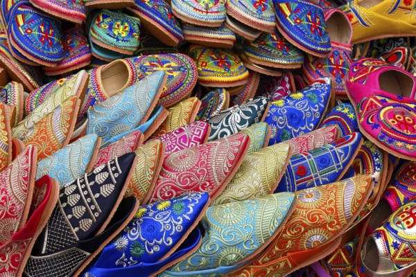 Sales stand with traditional colorful slippers at a market in Marrakech, historic old town, Medina, UNESCO World Heritage Site, Morocco
