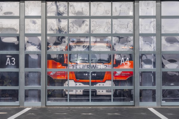 Fire department, fire station, modern guard, silver façade, glass gates, emergency vehicle, fire and rescue station 10, Gummersbacher Straße, Cologne, North Rhine-Westphalia, Germany