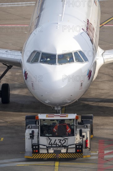 Eurowings Airbus is pushed from the gate onto the taxiway, ready to go, to Cologne/Bonn Airport, CGN, North Rhine-Westphalia, Germany