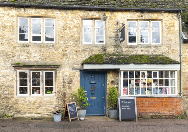 National Trust shop in historic Cotswold stone building, village of Lacock, Wiltshire, England, UK