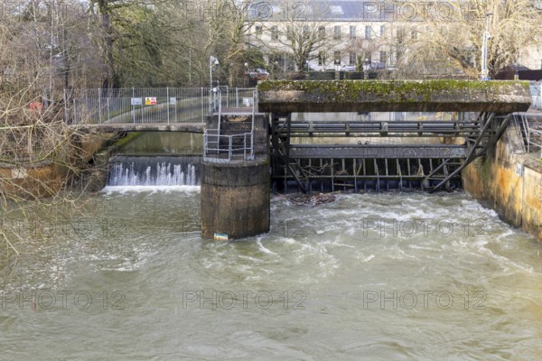 River Sluice Gate flood defence system in operation on River Avon, Chippenham, Wiltshire, England, UK