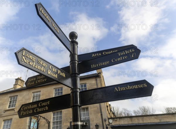 Fingerpost direct sign in historic town of Corsham, Wiltshire, England, UK