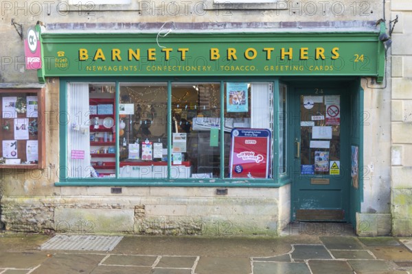 Frontage of traditional newsagent local shop, Barnett Brothers, High Street, Corsham, Wiltshire, England, UK