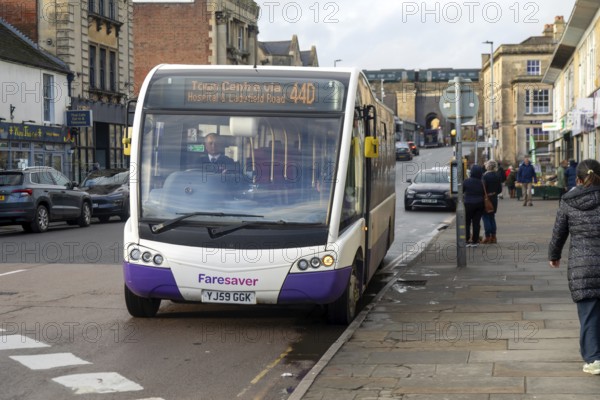 Optare Solo SR midibus single decker bus operated by Faresaver 44D service, town centre of Chippenham, Wiltshire, England, UK
