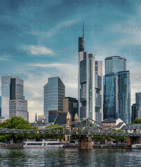 The Iron Bridge with the skyscrapers of Frankfurt's banking district, Frankfurt am Main, Hesse, Germany