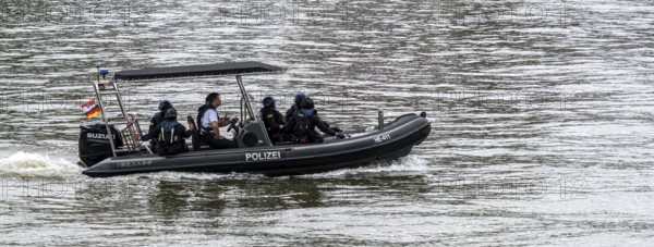 Police inflatable boat during an emergency trip on the Main in Frankfurt, Hesse, Germany