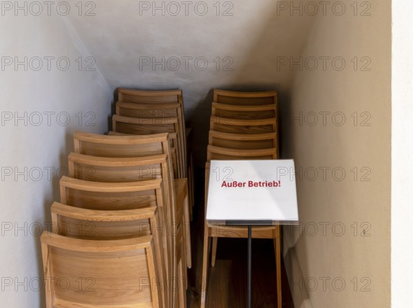 Stacks of wooden chairs in the restored and reopened garrison church in Breiten Straße, Potsdam, Brandenburg, Germany
