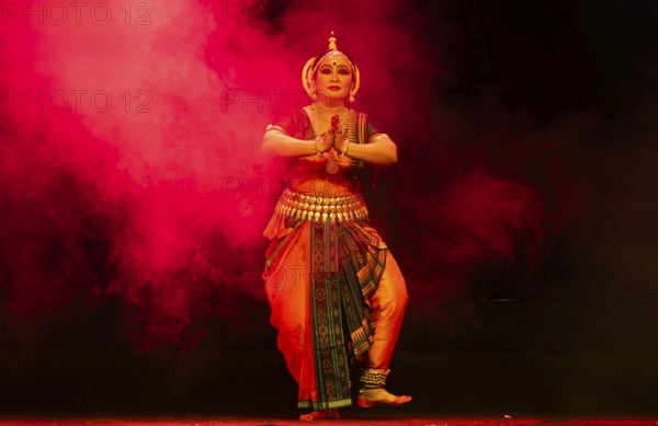 An artist perform Odissi classical dance during a cultural evening program at Shilpgram Mohotsav 2026 in Guwahati, India, on 21 January 2026