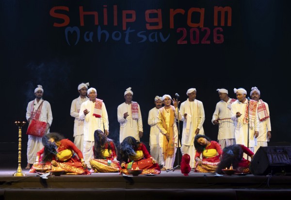 Artists perform 'Ojapali' folk song with Deodhani dance during a cultural evening program at Shilpgram Mohotsav 2026 in Guwahati, India, on 21 January 2026