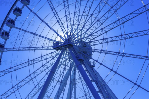 The Montreal Observation Ferris Wheel or La Grande Roue de Montreal amusement ride, Old Port of Montreal, Quebec, Canada. George Ferris (1859–96), is the American engineer who invented the ferris wheel