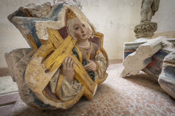 Medievally dressed woman with cross, remains of a wall relief, Blaubeuren Abbey, Swabian Jura, Baden-Württemberg, Germany