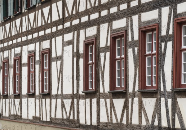 Old half-timbered house with brown-red windows, Fachwerk, Blaubeuren, Swabian Jura, Baden-Württemberg, Germany