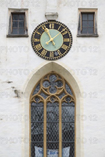 Large clock with gold-plated dial, Gothic window, Protestant Seminary, Blaubeuren, Swabian Jura, Baden-Württemberg, Germany