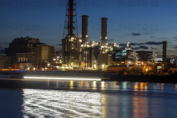 Evening shot of BASF in Ludwigshafen with the Rhine in the foreground