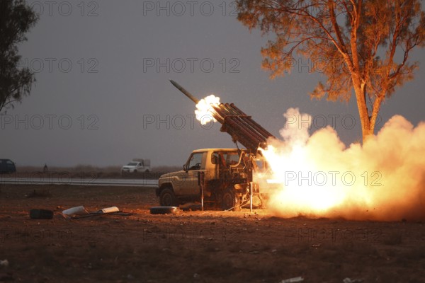 In Northeast Syria on January 17, 2026, the Syrian Army targets SDF forces with a truck-mounted multiple rocket launcher during a military escalation in the region, Raqqa, Raqqa, Syria