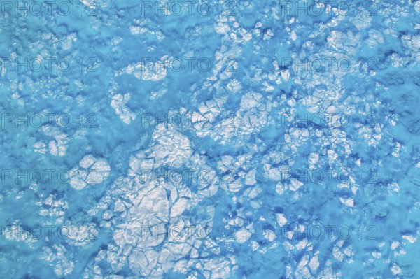 Aerial view of surface lakes (glacial/proglacial lakes), climate change, global warming, Arctic landscape with glaciers and snow-covered terrain, frozen wilderness, climate change, global warming, Greenland, geographically in North America, politically part of the Kingdom of Denmark